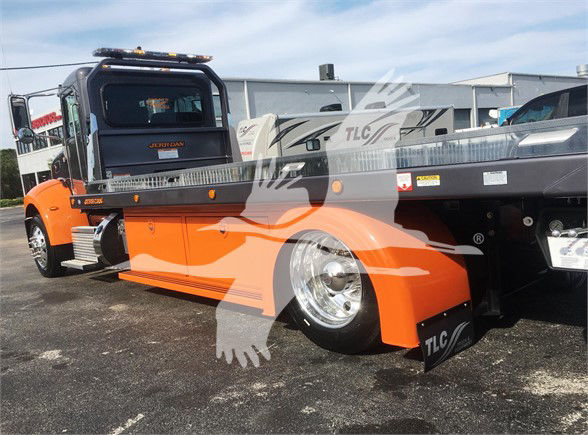 2022 Peterbilt 337 tow truck in orange and gray, side view showing flatbed with TLC branding and large chrome wheel, stock number J47166.