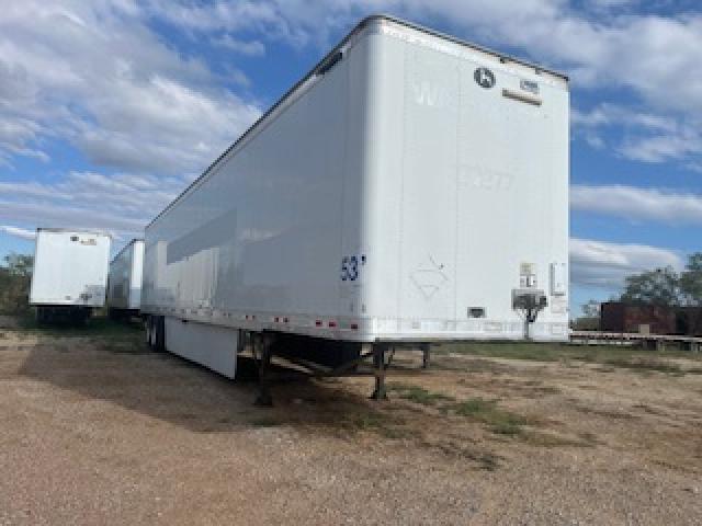 Great Dane 53x102 dry van trailer in a yard showing front and side profiles with a second trailer in the background.