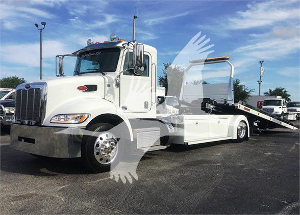 Peterbilt 337 tow truck with white cab and flatbed, stock number J51806, new truck.