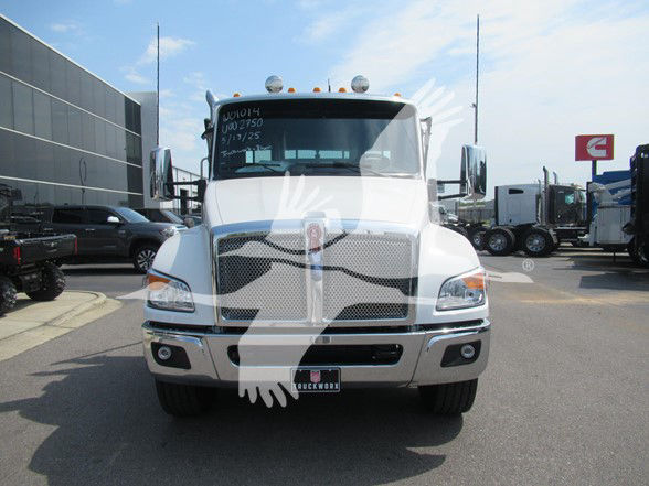 Kenworth T480 front view in white color showing grille, headlights, bumper, and side mirrors.