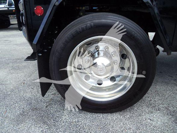 Wheel of a 2025 International MV truck showing polished alloy rim and tire.