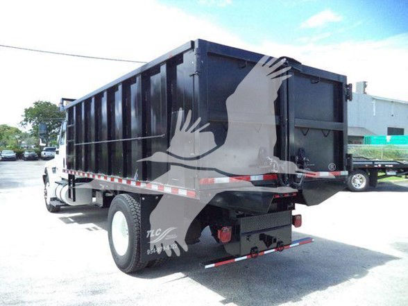 Dump truck rear left view showing cargo bed and taillights