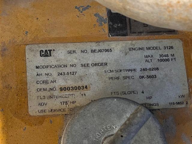Identification plate on Caterpillar engine of a Kalmar Ottawa 30 yard truck shows serial number BEJ07065, engine model 3126, max altitude 10000 ft, 3 4 8? Not legible.