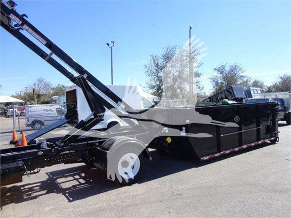 Isuzu NRR refuse truck with a hydraulic loading arm, side profile shows black body with white wheels and trailer hitch. Visible text includes small stickers and the truck body lines.