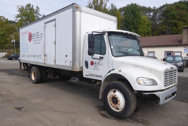 Box truck from a 2004 Freightliner M2 106 with a white cab and a large box body, VIN 1FVACWCS34HM79876, stock 0724232, company logo on the door.