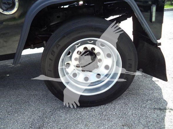 Wheel and front fender of a 2018 Ram 4500 SLT heavy-duty truck with a steel dual rear wheel, showing tire sidewall with 'I-19' or '11-19' marking and polished steel rim.