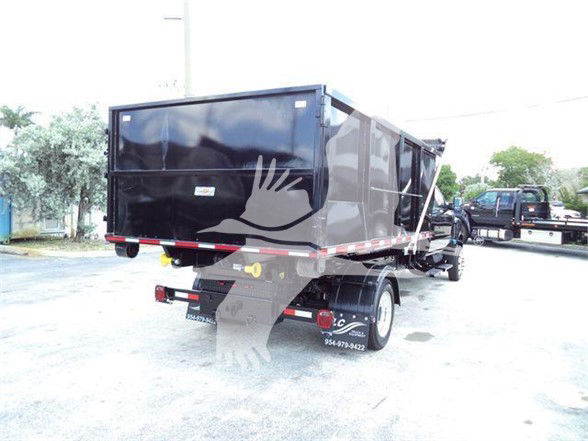 2023 International CV refuse truck trailer with rear dump bed showing stock number CV515CREW14SNG2.