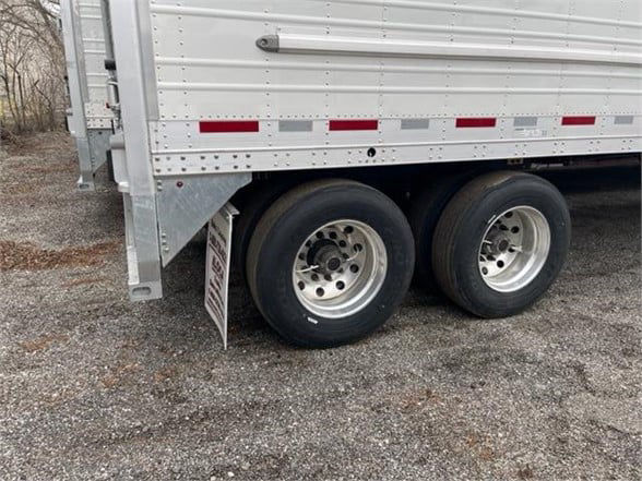 CIMC Cool Globe Reefer trailer showing dual rear wheels and aluminum side panels.