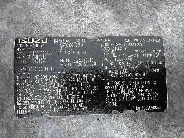 Isuzu NPR-HD engine label with engine family CSXH? 4HK1? Important engine information including engine family, displacement 317 CID/5933cc, exhaust emission control, fuel rate, service manual notes, and certifications. Visible text includes