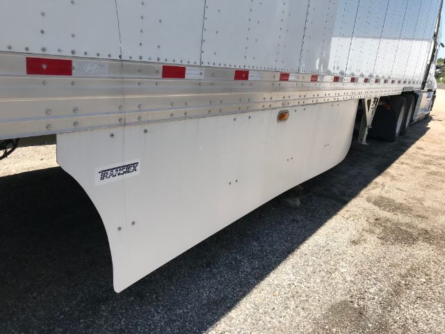 Trailer side with painted white fender and small 'TRAILER' badge.