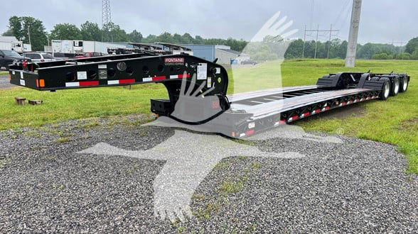 Fontaine Workhorse 55Lcc lowboy trailer with black frame, dual rear axles, and reflective red/white stripes. VIN/Stock not visible; shows Fontaine logo and trailer components.