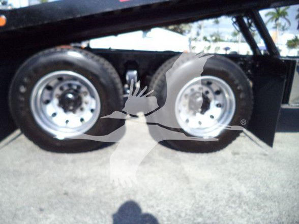 Freightliner Business Class M2 106 truck chassis showing dual rear wheels and part of the frame.