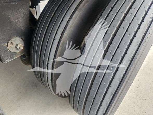 Wabash trailer wheel dual tires showing tread and hub area.