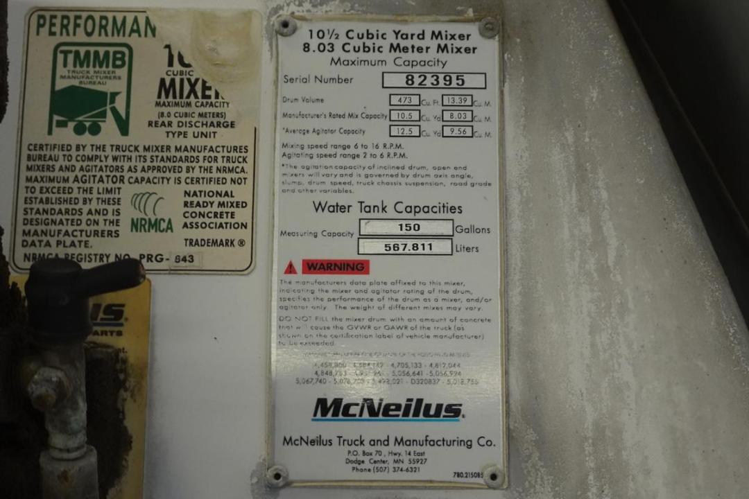 Label plate on 2007 Mack CTP713 mixer showing serial number 82395, water tank capacity 150 gallons, and McNeilus Truck and Manufacturing Co branding; additional text about maximum capacity and mixer specifications.