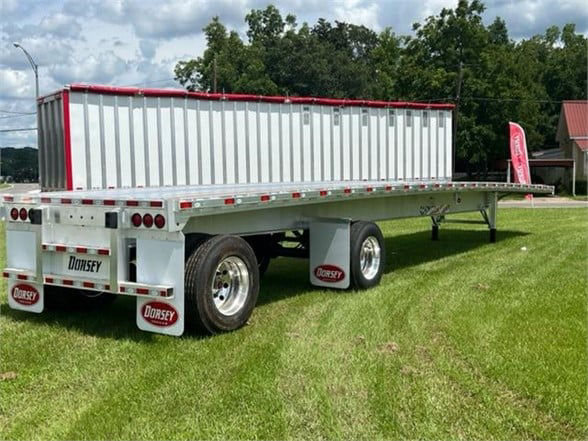 2024 Dorsey all-aluminum flatbed trailer, 48 ft, white with red frame, side rails, tandem axles, mud flaps with Dorsey logos.