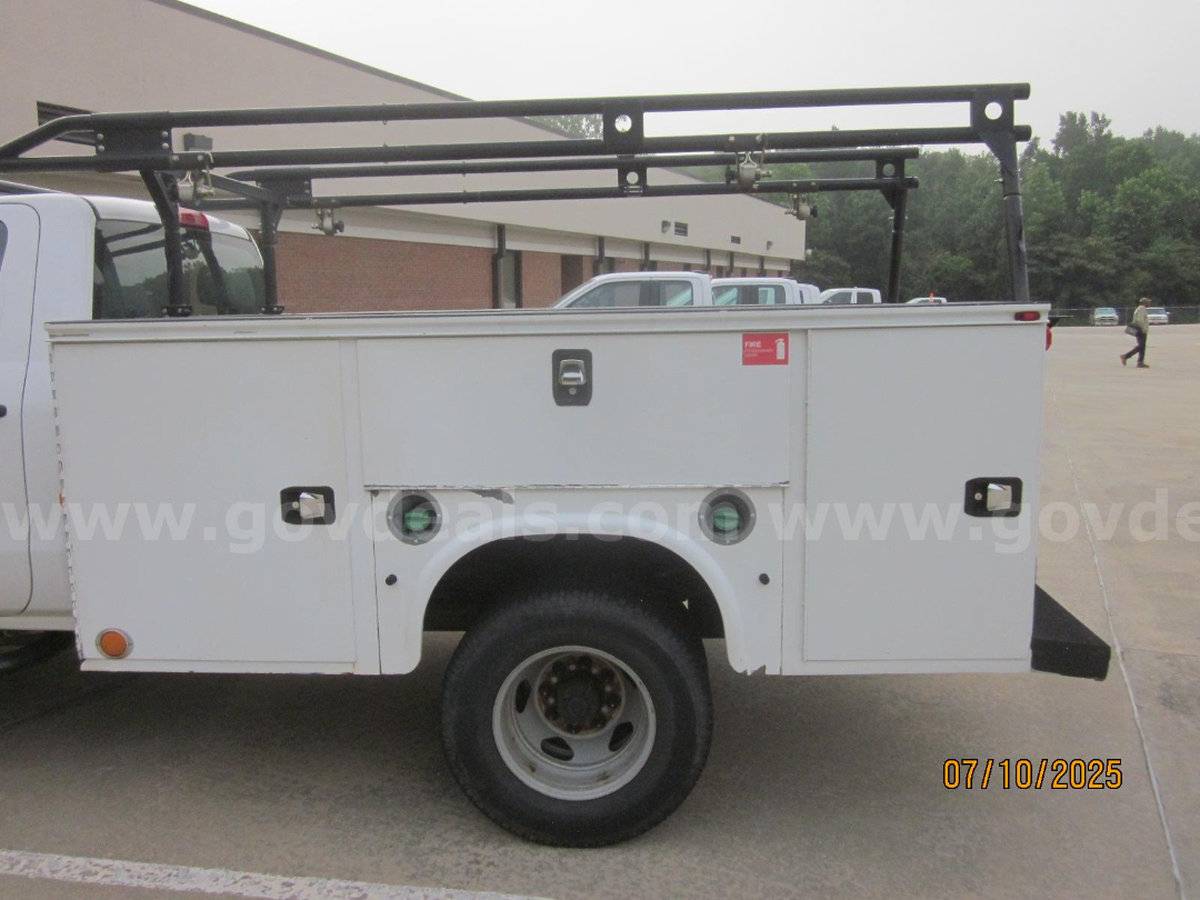 Service/Utility truck bed side with compartments and wheel, Chevrolet Silverado 3500HD utility body.