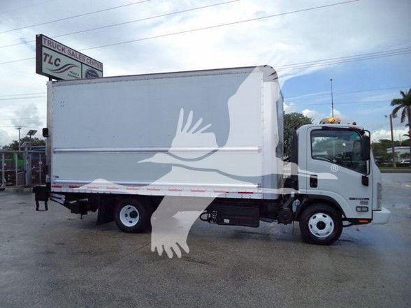 Isuzu NPR HD box truck side view showing cargo box and cab. No visible fluid labels or decals readable.