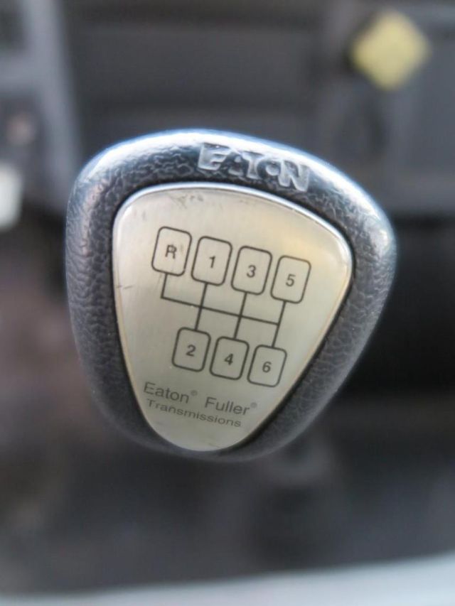 Gear shift knob with Eaton Fuller Transmissions shift pattern showing R, 1, 3, 5 on top row and 2, 4, 6 on bottom row.