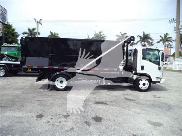 Isuzu NRR roll-off dump truck side view with black bed and white cab, showing crane arm and hydraulic components.