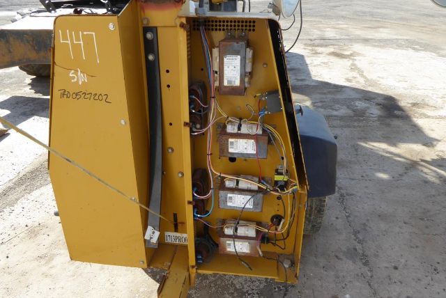 Allmand Night Lite Pro trailer-mounted light tower power cabinet with visible electrical modules and wiring.
