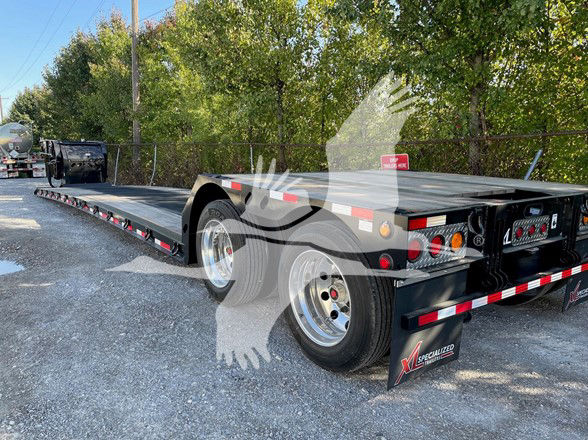 XL Specialized Mini Deck trailer with twin axles and low-profile deck, rear light cluster, and reflective tape; black finish; stock number 53-6191.
