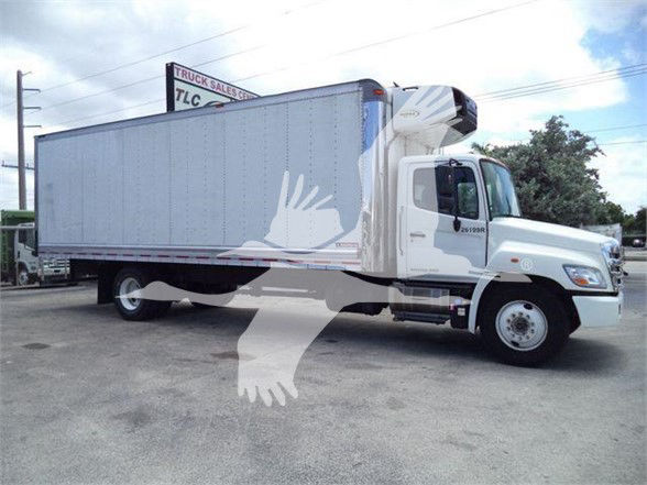 Box truck with refrigerated box, side view showing cab and reefer unit. Visible text includes a large stock/listing watermark and some small text on the cab and side door.