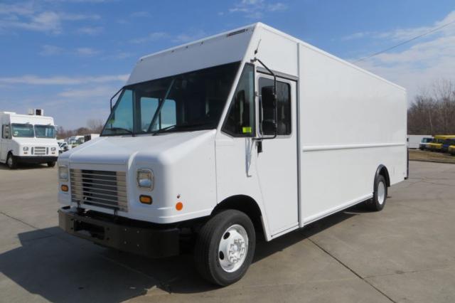 Box truck showing front and passenger side; white cargo area with cab; no visible branding; Ford-style grille.
