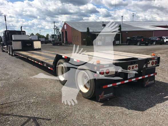 XL Specialized XL70MDE lowboy trailer in side and rear views showing dual rear axles, flatbed, and tail lights.