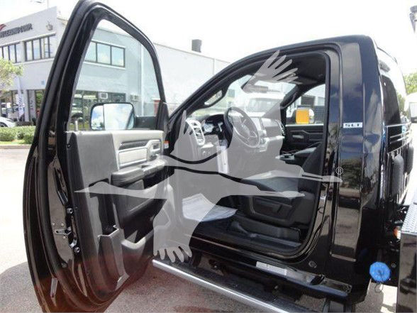 Ram 4500 SLT pickup truck with front passenger door open showing interior and dashboard. Visible text includes no specific model badges inside the image.