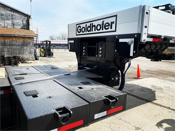 Goldhofer trailer part showing rear deck and hydraulic connection on a flatbed with Goldhofer branding.