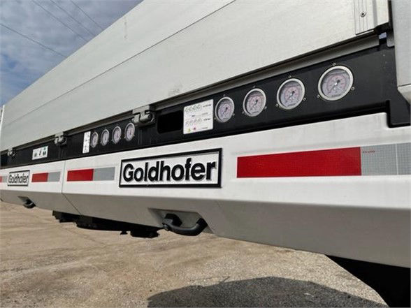 Trailer side panel with gauges and Goldhofer logo on a drop deck trailer.