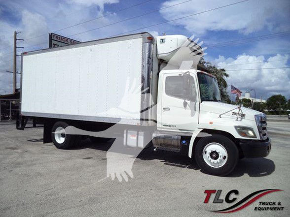 Truck body with refrigerated box and white cab, stock photo style, 2015 model year 268A.