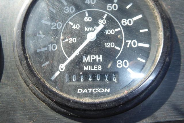 Dial gauge showing speedometer in MPH and km/h with odometer at 00204 miles; brand DATCON visible at bottom.