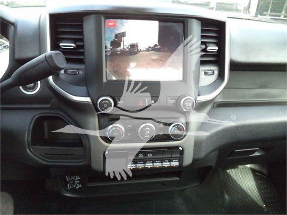 Ram 4500 interior dashboard with center touchscreen display and climate controls.