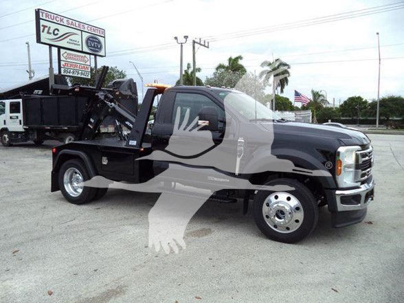 2024 Ford F450 tow truck with hydraulic dumpster bed showing VIN 1FDUF4HT0RDA40067 and stock J40067 at TLC Truck Sales Center.
