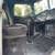 Interior view of a 1970s Peterbilt truck cab shows seats and dashboard with vintage steering wheel. Captioned as 1978 Peterbilt 359 listing.