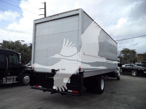 Side and rear view of a white box truck with a large cargo box. Text visible: VIN 1HTMMMML7KH514761, Stock Number T14761. Category: Box, Type: Trucks, NewUsed: Used.