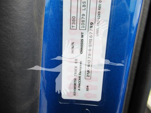 Kenworth T380 VIN label visible on door jamb area showing model T380, wheelbase 10879 LBS, MFG code, and other vehicle data.