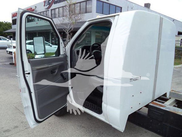 Ford E-450 work van with open front passenger door showing gray interior and white cargo area.