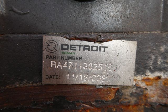 Detroit Reman part label on engine showing PART NUMBER RA471602515 and DATE 11/12/2021.
