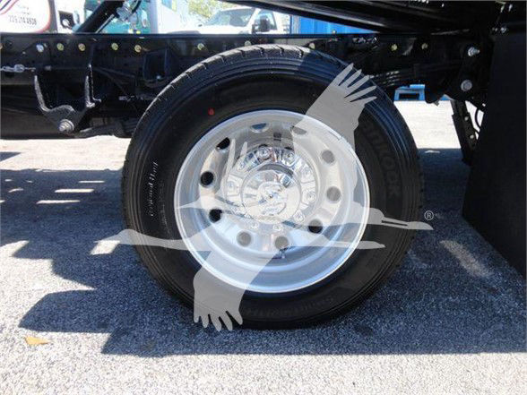 Ram 5500 wheel and tire on a truck chassis, with steel rim and surrounding frame visible.