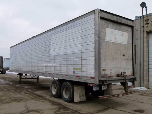 Trailer rear and side view showing a 48-foot refrigerated trailer with Trailmobile branding and standard double-axle rear wheels.