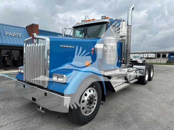 Kenworth W900L conventional daycab truck in blue with chrome bumper and grille, 2026 model year, stock TR219572LM.
