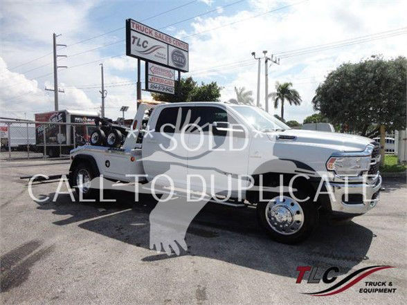 2024 Ram 5500 SLT truck in white with dual rear wheels and a long bed, TLC Truck & Equipment watermark across the image.