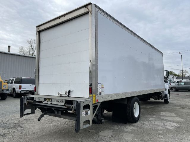 2017 Hino 268 box truck rear side view showing cargo box and rear bumper.