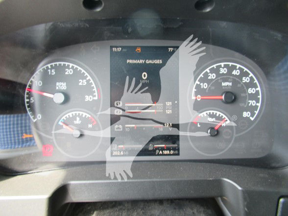 Kenworth T480 instrument cluster dashboard showing multiple gauges including RPM, speed, and a central display with ‘Primary Gauges’ text.