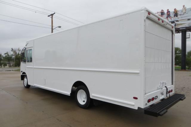 Truck side and rear view of a white 2008 Freightliner MT45 box truck in a dealership lot.
