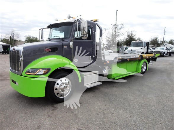 2022 Peterbilt 337 tow truck with limegreen and gray color scheme, front left view, stock number J56626.