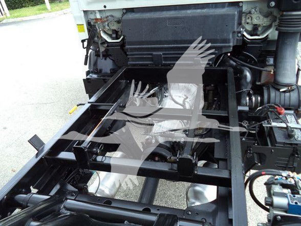 Truck chassis frame and engine bay of a 2017 Chevrolet W4500 with exposed frame rails and components visible.