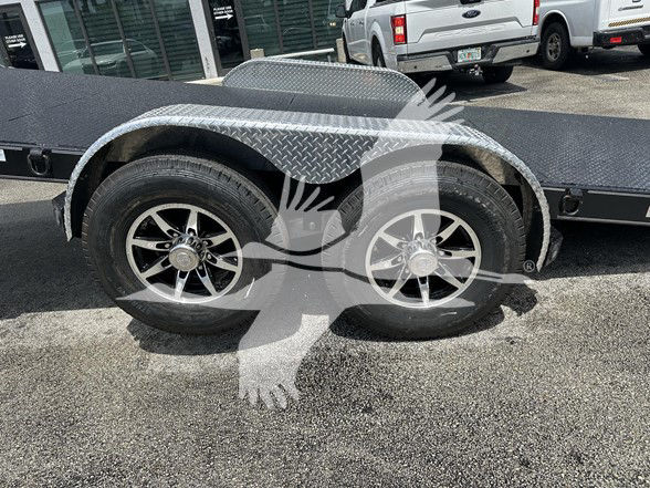 Trailer rear wheels and diamond-plate fender on a flatbed trailer. Visible text includes Stock Number FZTR00733FM, Category: Flatbed, Type: Trailers, New/Used: New.